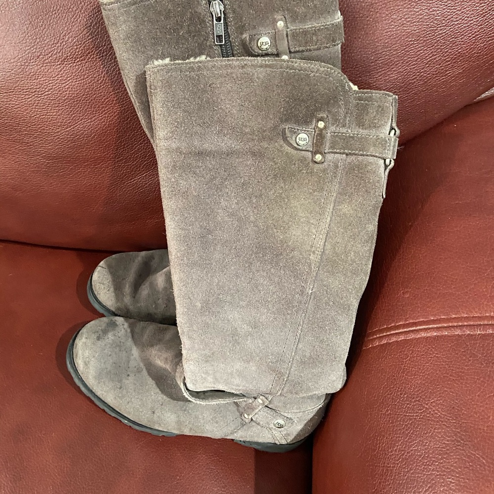 Suede tall  Heeled ugg boots.  Heel height 1 1/2 inch.